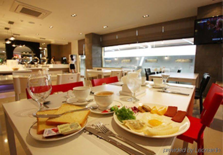 Suwon Reve Hotel Ресторант снимка